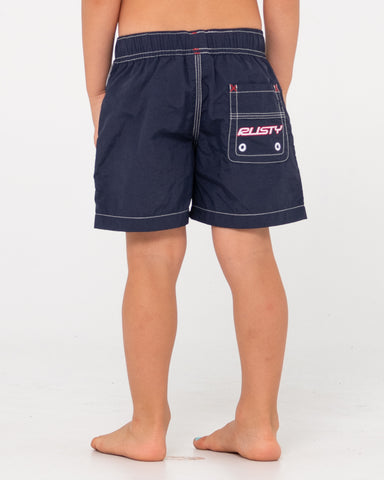 Boy wearing Flip Daddy Boardshort Runts in Navy Blue