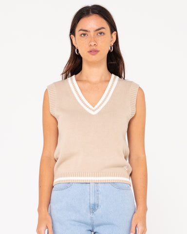 Woman wearing Nero Sleeveless Knit Vest in Oatmilk