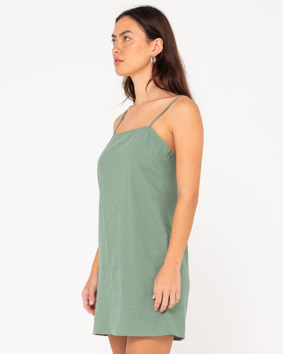 woman-wearing-sweet-water-mini-dress-in-sage-leaf