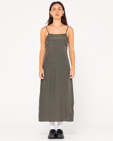 Woman wearing Porter Midi Dress in Sage Leaf