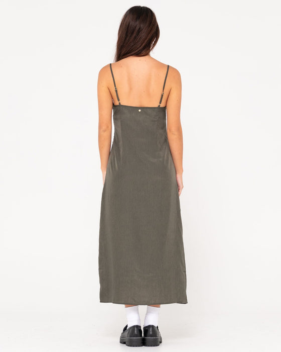 woman-wearing-porter-midi-dress-in-sage-leaf