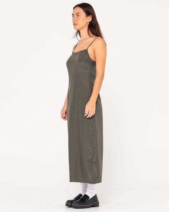 woman-wearing-porter-midi-dress-in-sage-leaf