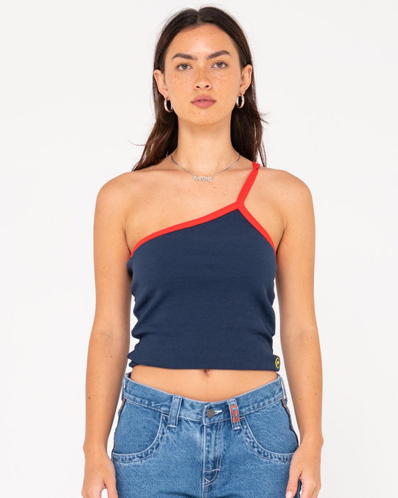 woman-wearing-sling-one-shoulder-contrast-skimmer-tank-in-navy