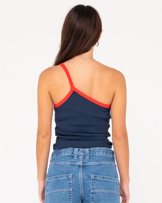 woman-wearing-sling-one-shoulder-contrast-skimmer-tank-in-navy