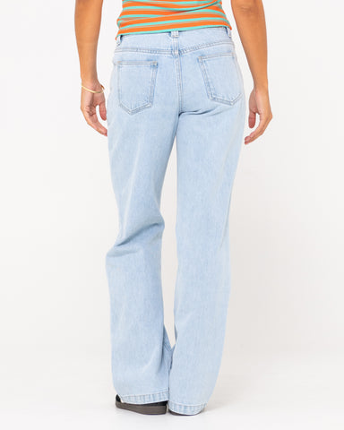 Woman wearing Low Rise Straight Leg Denim Jean in Sky Blue Heather