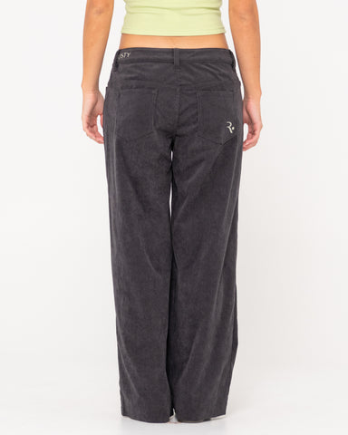 Woman wearing The Secret Low Rise Wide Leg Cord Pant in Vintage Black