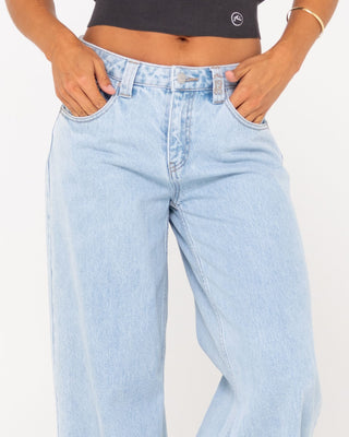 Woman wearing Low Rise Super Wide Leg Denim Jean in Sky Blue Heather