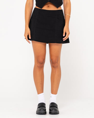 Woman wearing Sicily Mid Rise Skirt in Black