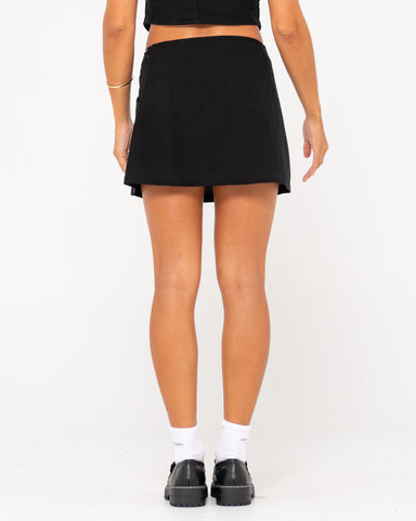 Woman wearing Sicily Mid Rise Skirt in Black