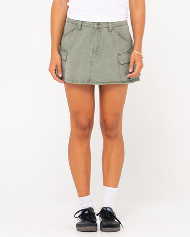 Woman wearing Brooks Low Rise Twill Cargo Skirt in Faded Pistachio