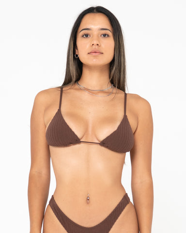 Woman wearing Lucky Triangle Bikini Top in Java