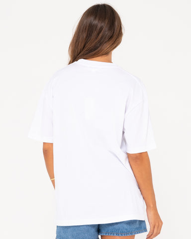 Woman wearing Wave Rider Oversize Short Sleeve Tee in White