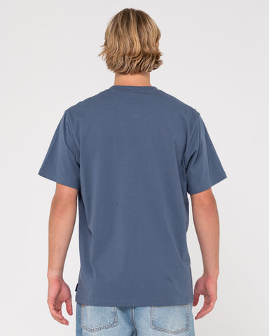 Man wearing Vital Rusty Short Sleeve Tee in China Blue