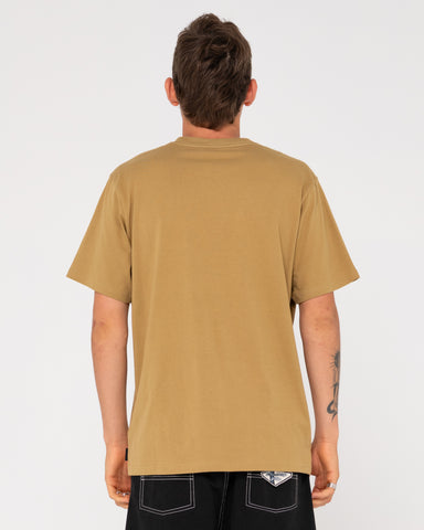 Man wearing Vital Rusty Short Sleeve Tee in Khaki