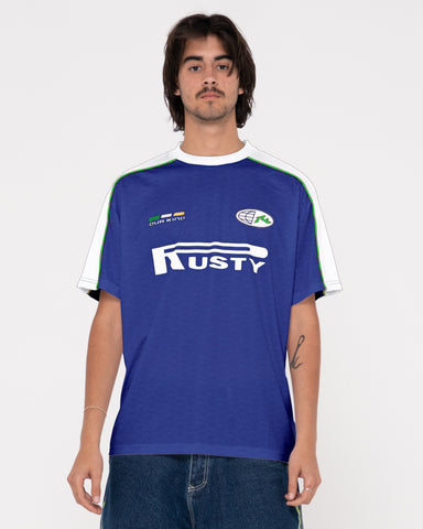 Man wearing Drogba Short Sleeve Soccer Jersey in Royal Blue