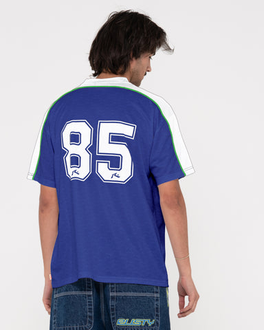 Man wearing Drogba Short Sleeve Soccer Jersey in Royal Blue