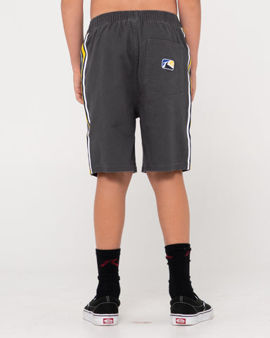 Boy wearing Deadly Rodge Short Boys in Coal