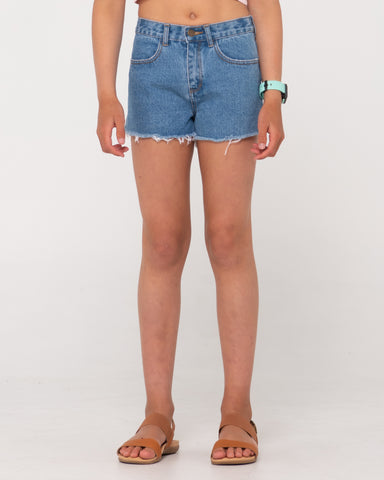 Girl wearing Penny Kick Flare Denim Short Girls in Sea Blue