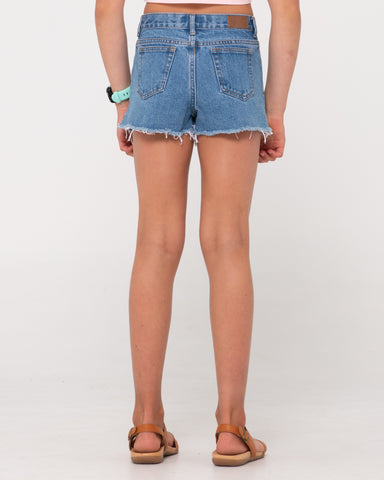 Girl wearing Penny Kick Flare Denim Short Girls in Sea Blue