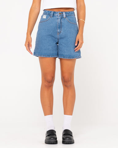 Woman wearing Cyprus High Denim Short in Sea Blue