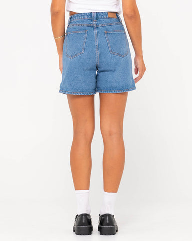 Woman wearing Cyprus High Denim Short in Sea Blue