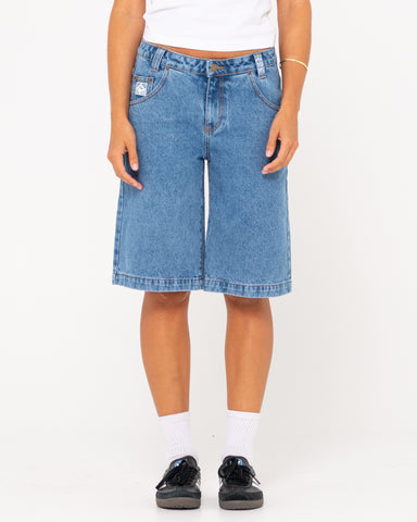 Woman wearing Low Rise Wide Leg Denim Jort in Sea Blue