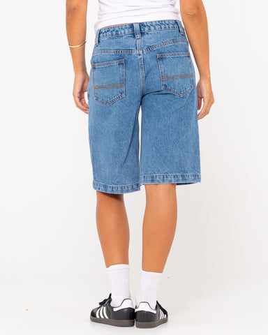 Woman wearing Low Rise Wide Leg Denim Jort in Sea Blue