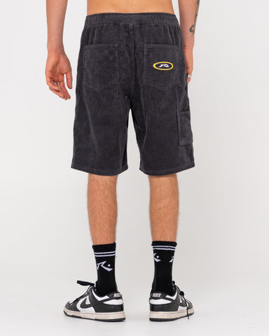 Man wearing 8 Wale Workwear Elastic Short in Coal