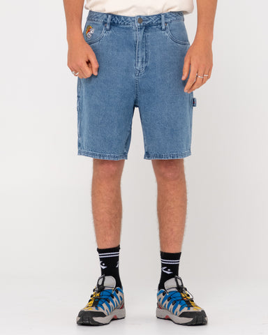 Man wearing Dungaree Denim Walkshort in Middy Blue