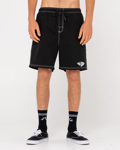 Man wearing Manila Folder 19 Heritage Elastic Short in Black