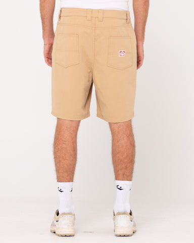 Man wearing Lucifer Loose Twill Short in Light Khaki