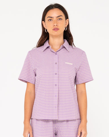 Woman wearing Checked Out Short Sleeve Shirt in Purple Nights