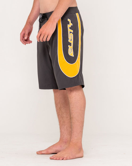 man-wearing-charger-boardshort-in-coal
