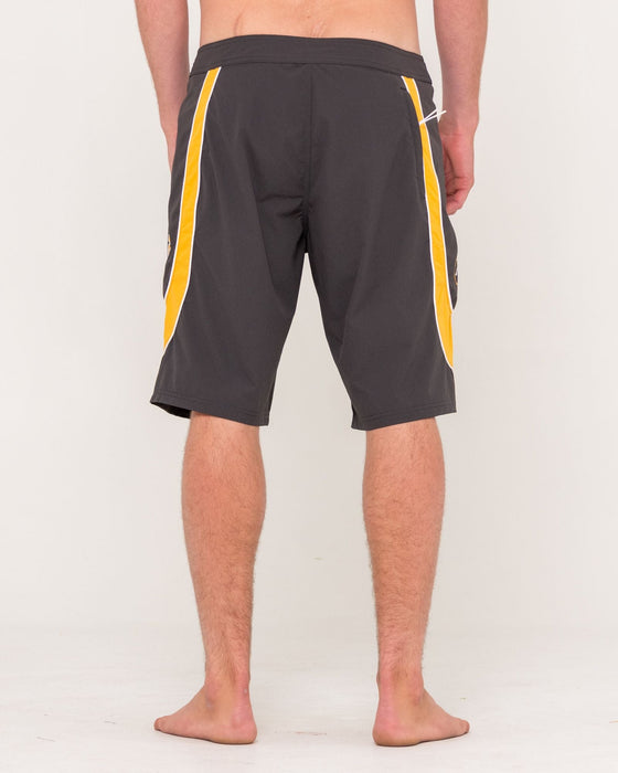 man-wearing-charger-boardshort-in-coal