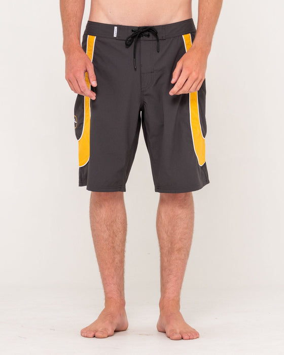man-wearing-charger-boardshort-in-coal
