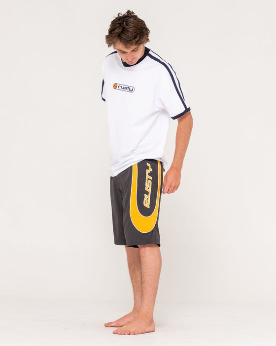 man-wearing-charger-boardshort-in-coal