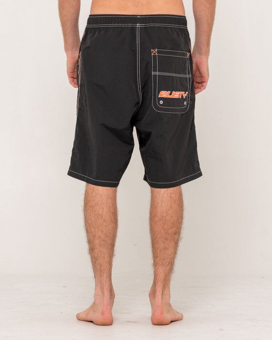 man-wearing-flip-daddy-boardshort-in-black-2