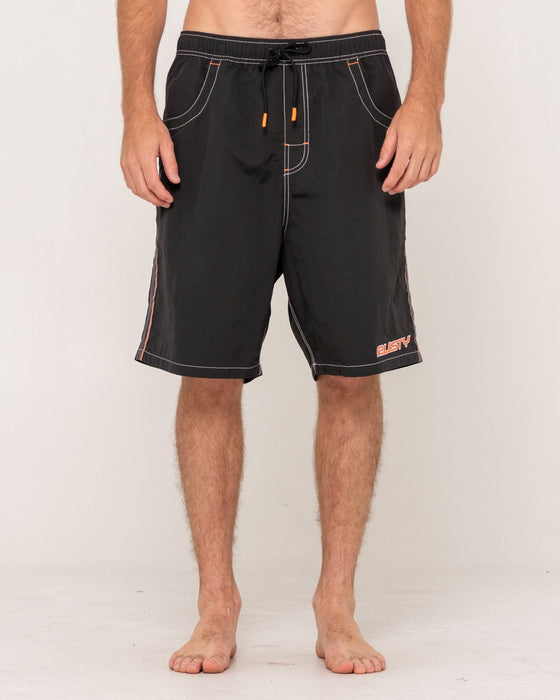 man-wearing-flip-daddy-boardshort-in-black-2