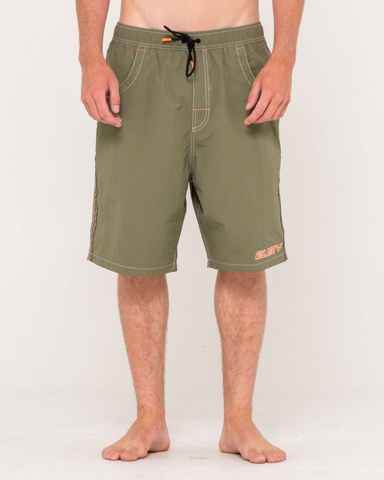 man-wearing-flip-daddy-boardshort-in-savanna-1