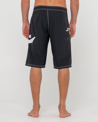 Man wearing Fixed Competition Revolution Boardshort in Black