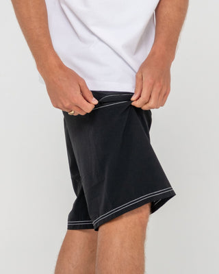 Man wearing Fixed Competition Revolution Boardshort in Black
