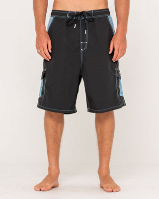 Man wearing Tech Mechanisms Boardshort in Black 1