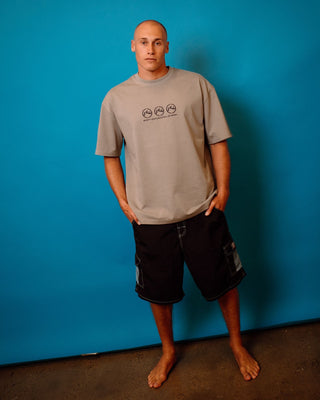 Man wearing Tech Mechanisms Boardshort in Black 1