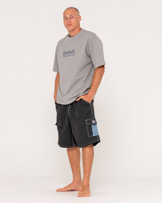 Man wearing Tech Mechanisms Boardshort in Black 1
