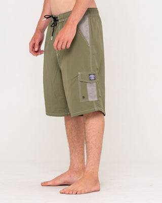 Man wearing Tech Mechanisms Boardshort in Savanna