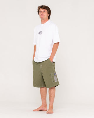Man wearing Tech Mechanisms Boardshort in Savanna