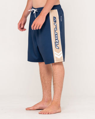 Man wearing Spitfire Hybrid Waist Boardshort in Navy Blue