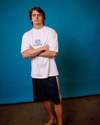 Man wearing Spitfire Hybrid Waist Boardshort in Navy Blue