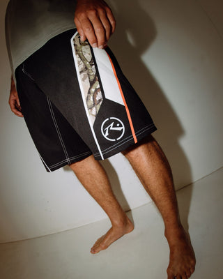 Man wearing Chopper Treed Fixed Waist Boardshort in Black