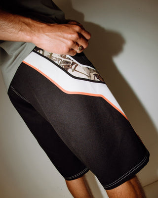 Man wearing Chopper Treed Fixed Waist Boardshort in Black